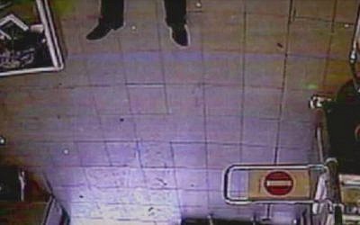 An image from CCTV footage from inside the Hyper Cacher during the siege on January 9, 2015, taken from a BBC documentary called Three Days of Terror: The Charlie Hebdo Attacks that aired January 6, 2016. (screen capture: YouTube)
