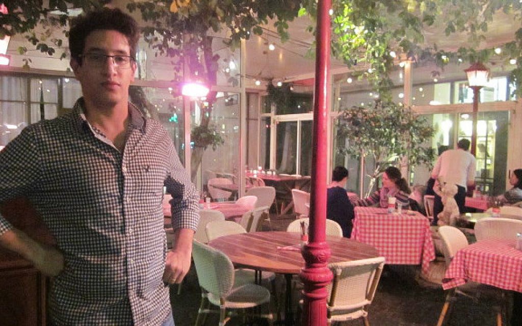 Bistro owner Itai Shapira said business is dismal at his restaurant on Dizengoff, and he's not surprised (Eliana Block/Times of Israel) Bistro owner Itai Shapira said business is dismal at his restaurant on Dizengoff, and he's not surprised (Eliana Block/Times of Israel)