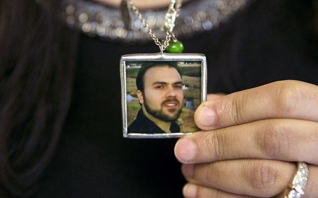 Naghmeh Abedini holds a necklace with a photograph of her husband, Saeed Abedini, on Capitol Hill in Washington, June 2, 2015 (AP Photo/Jacquelyn Martin, File) Naghmeh Abedini holds a necklace with a photograph of her husband, Saeed Abedini, on Capitol Hill in Washington, June 2, 2015 (AP Photo/Jacquelyn Martin, File)