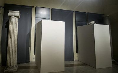 Wooden panels cover statues inside the Rome's Capitoline Museums, Rome, Italy, January 25, 2016. (Giuseppe Lami/ANSA via AP)
