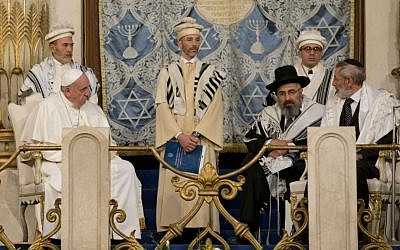 Pope Francis sits flanked by Rabbi Riccardo Di Segni, right, during his visit to the Great Synagogue of Rome, Sunday, Jan. 17, 2016. (AP Photo/Alessandra Tarantino)