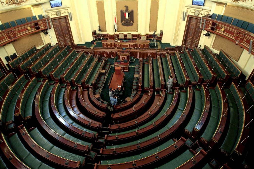  In this Sunday, Jan. 22, 2012 file photo, officials are seen in the People's Assembly as final preparations are made for an opening session of parliament, in Cairo. (AP Photo/Ahmed Gomaa, File)