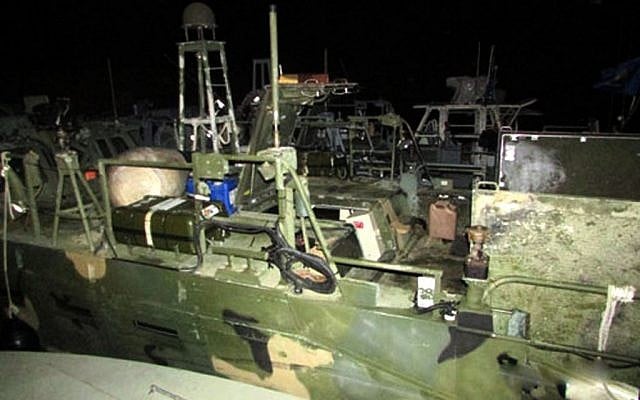 This picture released by the Iranian Revolutionary Guards on Wednesday, Jan. 13, 2016, shows American Navy boats in custody of the guards (Sepahnews via AP)