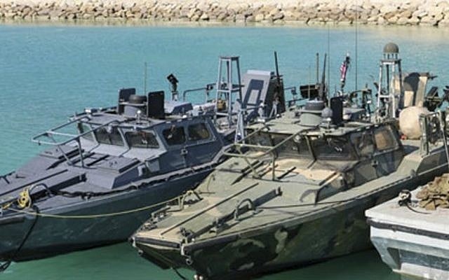 This picture released by the Iranian Revolutionary Guards on Wednesday, Jan. 13, 2016, shows detained US Navy sailors' boats in custody of the guards in the Persian Gulf. (Sepahnews via AP)