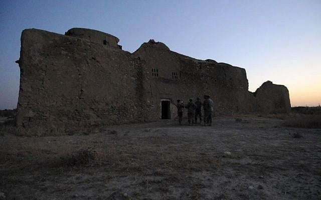 US soldiers stand at the entrance to the ruins of St. Elijah’s Monastery after completing a tour there, at Forward Operating Base Marez in Mosul, Iraq, August 21, 2009. (MC1 (SCW) Carmichael Yepez/U.S. Army via AP) US soldiers stand at the entrance to the ruins of St. Elijah’s Monastery after completing a tour there, at Forward Operating Base Marez in Mosul, Iraq, August 21, 2009. (MC1 (SCW) Carmichael Yepez/U.S. Army via AP)