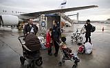 Jewish immigrants from Ukraine arrive at Ben-Gurion International Airport. (AP Photo/Oded Balilty, File)