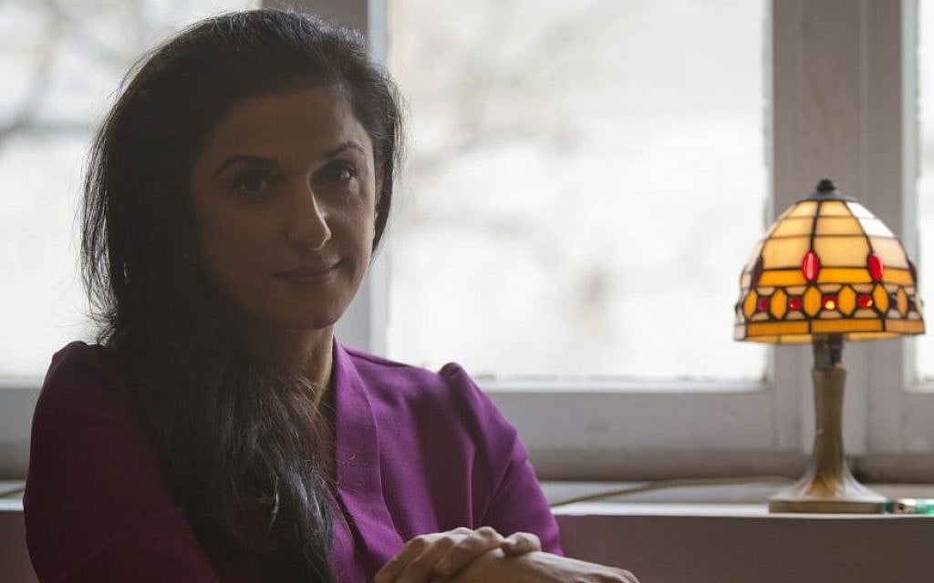 Israeli author Dorit Rabinyan, sits at her house in Tel Aviv, Israel, January 11, 2016. (AP/Sebastian Scheiner) Israeli author Dorit Rabinyan, sits at her house in Tel Aviv, Israel, January 11, 2016. (AP/Sebastian Scheiner)
