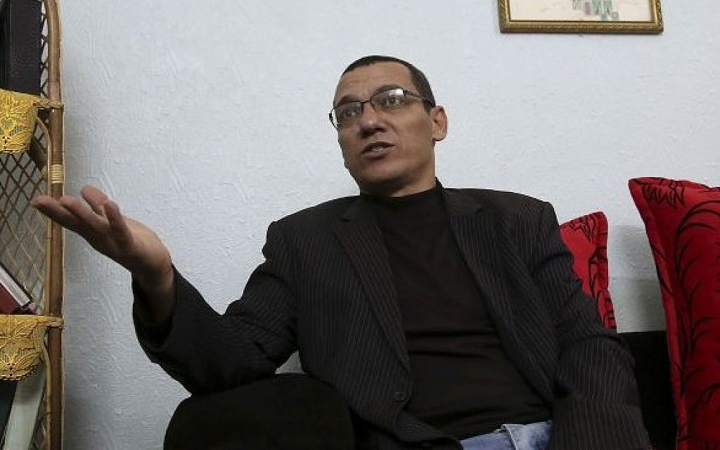 Palestinian journalist Ayman al-Aloul, 44, talks during an interview with the Associated Press on January 12, 2016. (AP/Adel Hana) Palestinian journalist Ayman al-Aloul, 44, talks during an interview with the Associated Press on January 12, 2016. (AP/Adel Hana)