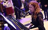 Zionist Union MK Stav Shaffir performs during the 50th anniversary of the Knesset on Tuesday, January 19 2016. (Knesset)