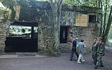 In this July 17, 2004 file photo, tourists visit the ruins of Adolf Hitler's headquarters in the bunker Wolf Lair in Gierloz, northeastern Poland. (AP Photo/Czarek Sokolowski, File)