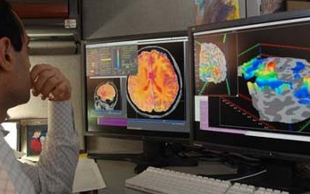 Illustrative image of a researcher checking fMRI images. (Wikimedia commons)