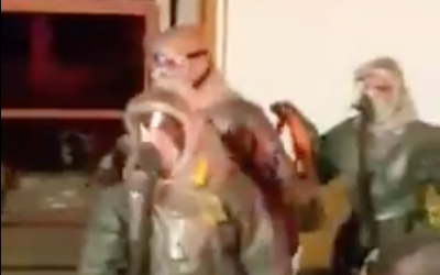 File: A fire department hazmat team removes a suspicious envelope containing an unknown white powder from a Rishon Lezion home on January 7, 2016. (screen capture)