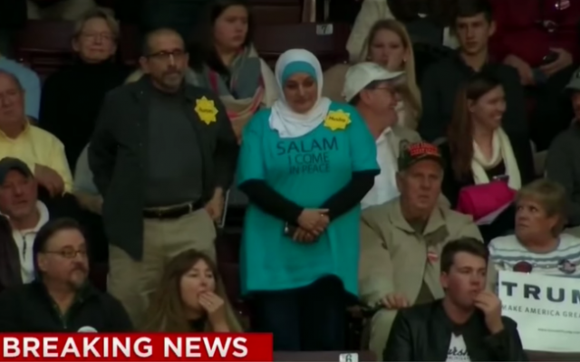 Rosa Hamid and Marty Rosenbluth stage a silent protest at Trump rally, January 8, 2016 (CNN screenshot) Rosa Hamid and Marty Rosenbluth stage a silent protest at Trump rally, January 8, 2016 (CNN screenshot)