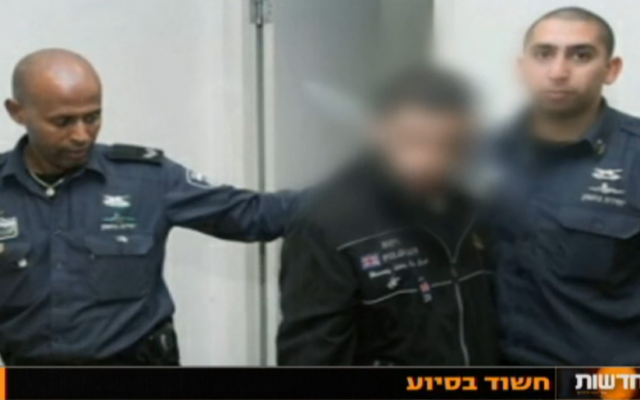A key suspect in the Nashat Milhem case is remanded on January 10, 2015 (Channel 10 screenshot) A key suspect in the Nashat Milhem case is remanded on January 10, 2015 (Channel 10 screenshot)