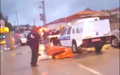 A police vehicle arrives to the scene of a stabbing attack in Beit Horon, outside of Jerusalem on January 25, 2016. (Magen David Adom) A police vehicle arrives to the scene of a stabbing attack in Beit Horon, outside of Jerusalem on January 25, 2016. (Magen David Adom)