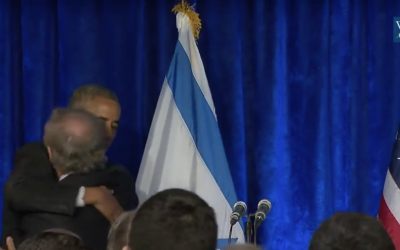Steven Spielberg and President Barack Obama embrace at a Holocaust remembrance ceremony at the Israeli Embassy in Washington, January 27, 2016 (YouTube screenshot)