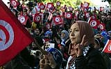 Illustrative: Tunisian women celebrating the fifth anniversary of the Arab Spring in Tunis, Tunisia, on January 14, 2016. (AP/Riadh Dridi)