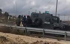 Border Police arrest a Palestinian man who was found with a knife at the Tapuah checkpoint in the northern West Bank on January 4, 2016. (Israel Police)