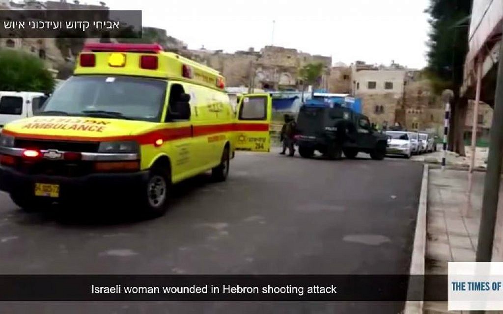 An ambulance at a shooting attack near Hebron's Tomb of the Patriarchs, Sunday, January 3, 2015. (YouTube screenshot)