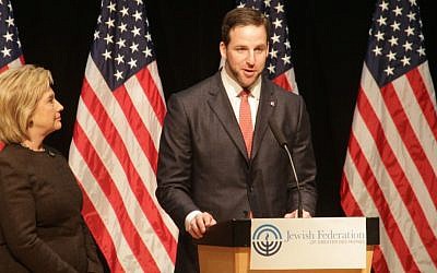 David Adelman, president of the Jewish Federation of Greater Des Moines, introducing Hillary Clinton before a speech at federation headquarters, January 25, 2016. (Josh Tapper)