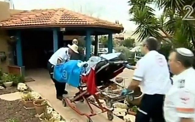 Paramedics carrying Shmuel Rada, father of Tair Rada to attend the dedication of a synagogue in his daughter's name on Thursday, January 14 2016. (Screen capture Channel 2) Paramedics carrying Shmuel Rada, father of Tair Rada to attend the dedication of a synagogue in his daughter's name on Thursday, January 14 2016. (Screen capture Channel 2)