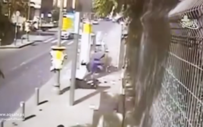 Footage of Alaa Abu Jamal stabbing passers-by in a Jerusalem terror attack on October 15, 2014. The attack is praised in the song "Lovers of Stabbing" while the clip plays in the background. (screen capture: YouTube)