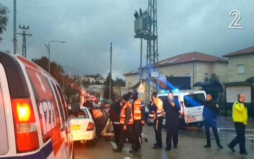 Paramedics at the scene of a stabbing attack in Beit Horon on January 25, 2016. (screen capture: Channel 2)