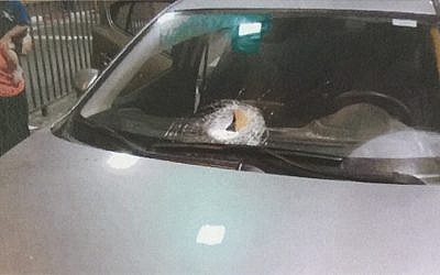 A car damaged by a rock allegedly thrown by Arab youth on the Route 443 highway outside of Jerusalem. (courtesy Shin Bet security service)