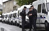 French police conducting an operation in La Courneuve, near Paris, Aug. 27, 2015. (Miguel Medina/AFP/Getty Images, via JTA)