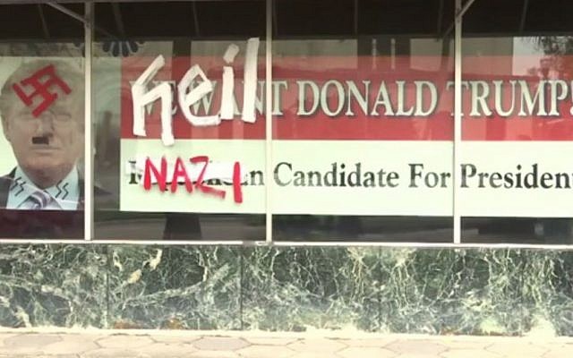 A Donald Trump campaign poster on a Florida building owned by a Jewish woman was defaced to make the front-running GOP candidate look like Adolf Hitler on January 4, 2016. (screen capture: News4Jax)