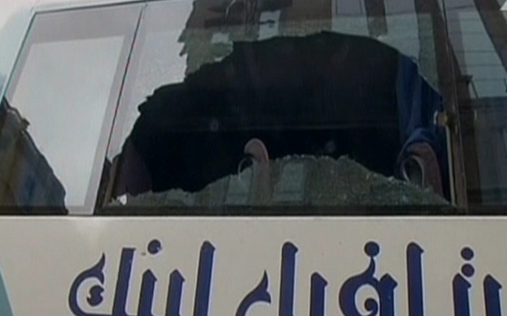 The broken window of a bus used by Arab Israeli tourists following an attack in Cairo on January 7, 2016 (screen capture: Channel 2) The broken window of a bus used by Arab Israeli tourists following an attack in Cairo on January 7, 2016 (screen capture: Channel 2)
