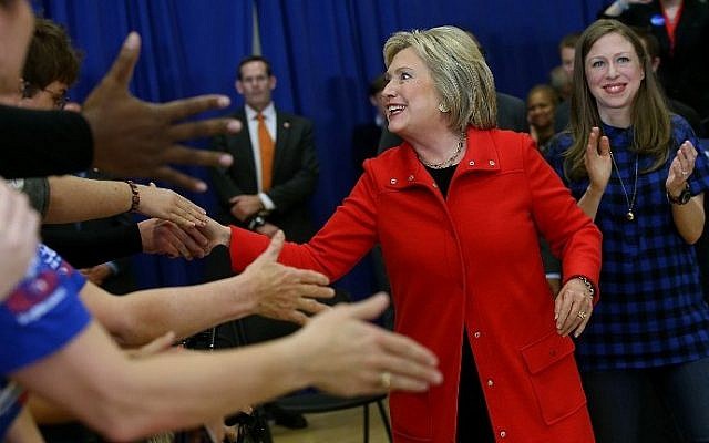 Democratic presidential candidate former Secretary of State Hillary Clinton greets supporters during a "get out to caucus" event at Washington High School on January 30, 2016 in Cedar Rapids, Iowa. (Justin Sullivan/Getty Images/AFP)