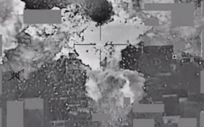 File. An image from a video released by the US Defense Department the American bombing of an Islamic State cash stockpile in Mosul, Iraq on January 11, 2016. (Screen capture: Defense Video & Imagery Distribution System)