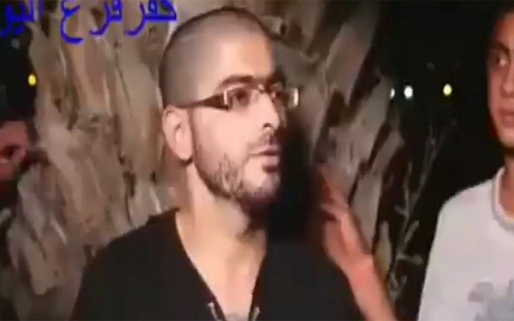 Nashat Milhem is seen competing in a street quiz during Ramadan in footage that emerged of the Tel Aviv gunman, January 2016. (Screen capture: Channel 2)