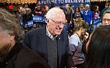 Democratic presidential candidate Sen. Bernie Sanders, I-Vt. greets a visitor after speaking at the Fort Museum Opera House in Fort Dodge, Iowa, January. 19, 2016. (AP Photo/Andrew Harnik)
