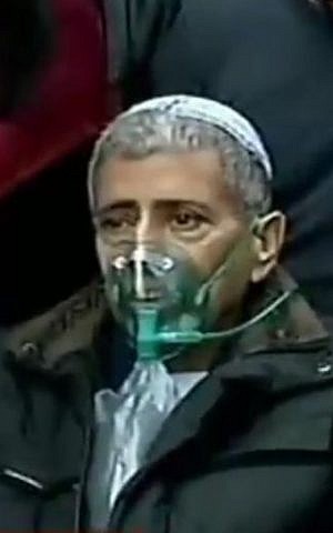 Shmuel Rada, father of Tair Rada in Kaztrin during a ceremony to dedicate a synagogue in his daughter's name. (Screen capture channel 2)