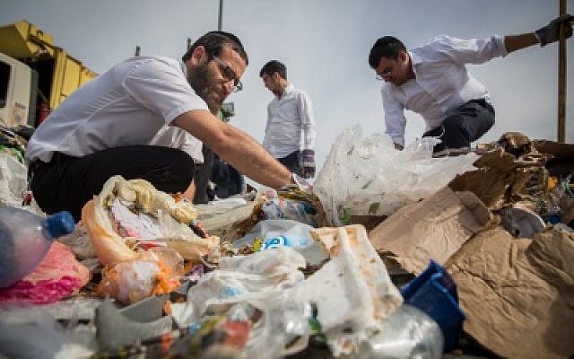 File: Ultra Orthodox Jews search in a pile of garbage at Jeruslem's Givat Shaul city dump, after losing a very expensive engagement ring, on January, 21, 2016. (Hadas Parush/Flash90) File: Ultra Orthodox Jews search in a pile of garbage at Jeruslem's Givat Shaul city dump, after losing a very expensive engagement ring, on January, 21, 2016. (Hadas Parush/Flash90)