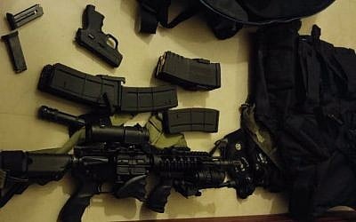 Weapons and ammunition seized by IDF soldiers in the West Bank village of Kfar Itrach, January 11, 2016. (IDF Spokesman)