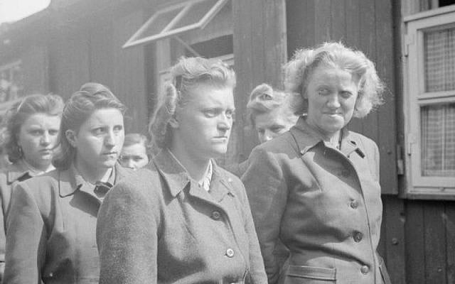 During the liberation of Bergen-Belsen concentration camp in April of 1945, guards with the SS were paraded for work in clearing the dead. (Wikimedia Commons)