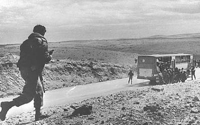 Yamam officers storm the bus during the 'mother's bus attack' in southern Israel on March 7, 1988. (Government Press Office)