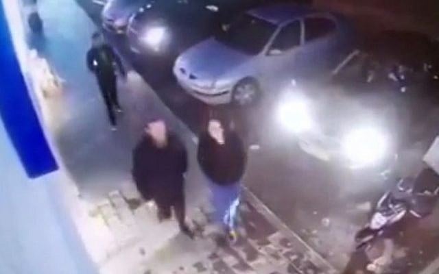 Assailant immediately before he stabbed Menachem Mendel Rivkin in Givat Ze'ev on January 27, 2016 (Channel 10 screenshot) Assailant immediately before he stabbed Menachem Mendel Rivkin in Givat Ze'ev on January 27, 2016 (Channel 10 screenshot)