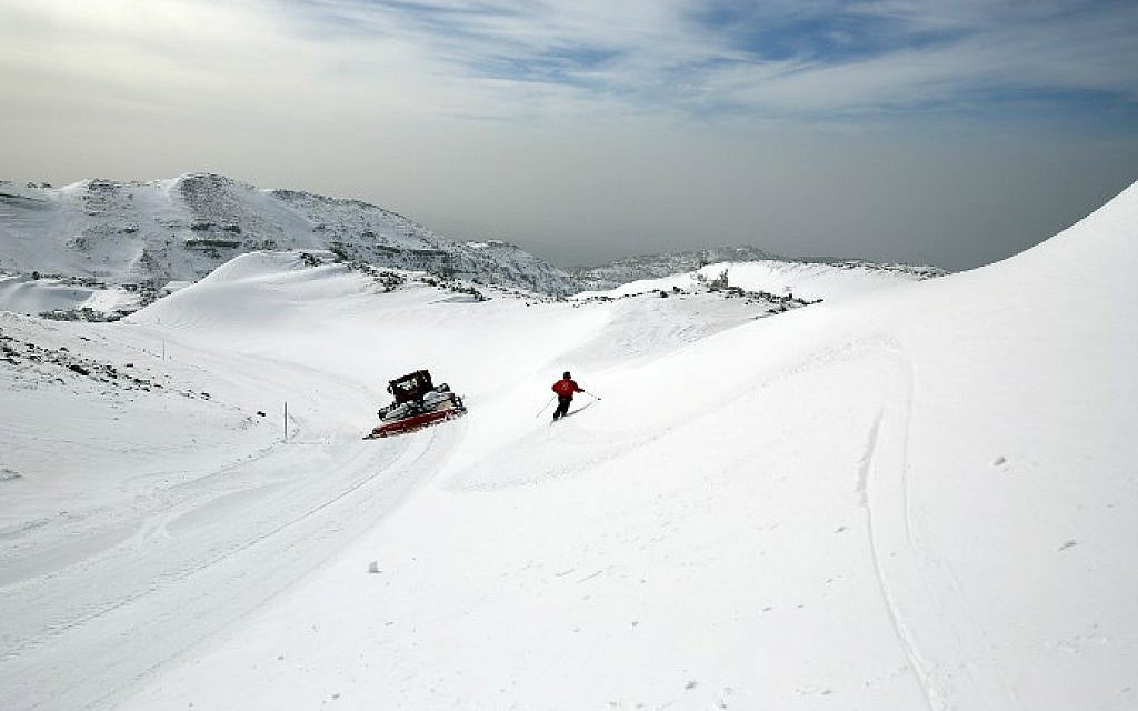 An Israeli ski patrol member skis at the Mount Hermon ski resort on the Golan Heights, on January 21, 2016. (Thomas Coex/AFP) An Israeli ski patrol member skis at the Mount Hermon ski resort on the Golan Heights, on January 21, 2016. (Thomas Coex/AFP)