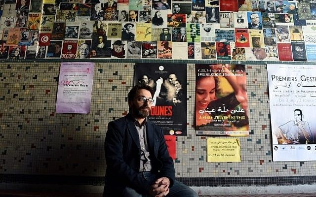 Tunisian director Mohamed Ben Attia poses during a photo shoot at a movie theater in Tunis on January 29, 2016. (AFP / FETHI BELAID) Tunisian director Mohamed Ben Attia poses during a photo shoot at a movie theater in Tunis on January 29, 2016. (AFP / FETHI BELAID)