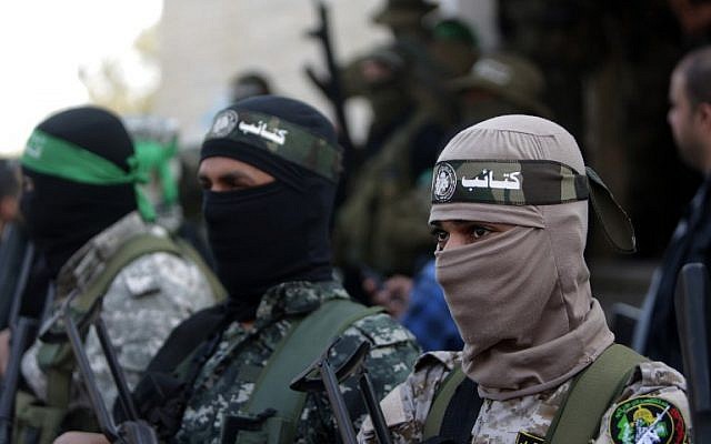 Members of the Izz ad-Din al-Qassam Brigades, the armed wing of the Hamas movement, at the funeral of fellow terrorist Ahmed al-Zahar in the village of Al-Moghraga near the Nuseirat refugee camp in the central Gaza Strip on February 3, 2016. (AFP/Mahmud Hams) Members of the Izz ad-Din al-Qassam Brigades, the armed wing of the Hamas movement, at the funeral of fellow terrorist Ahmed al-Zahar in the village of Al-Moghraga near the Nuseirat refugee camp in the central Gaza Strip on February 3, 2016. (AFP/Mahmud Hams)