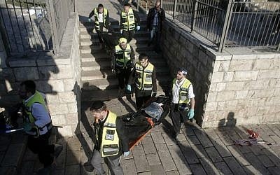 Medics carry the bodies of two Palestinian attackers killed during a shooting and stabbing assault at Damascus Gate, outside Jerusalem's Old City on February 3, 2016. (Ahmad Gharabli/AFP) Medics carry the bodies of two Palestinian attackers killed during a shooting and stabbing assault at Damascus Gate, outside Jerusalem's Old City on February 3, 2016. (Ahmad Gharabli/AFP)