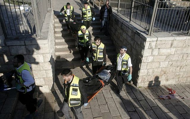 Medics carry the bodies of two Palestinian attackers killed during a shooting and stabbing assault at Damascus Gate, outside Jerusalem's Old City on February 3, 2016. (Ahmad Gharabli/AFP) Medics carry the bodies of two Palestinian attackers killed during a shooting and stabbing assault at Damascus Gate, outside Jerusalem's Old City on February 3, 2016. (Ahmad Gharabli/AFP)