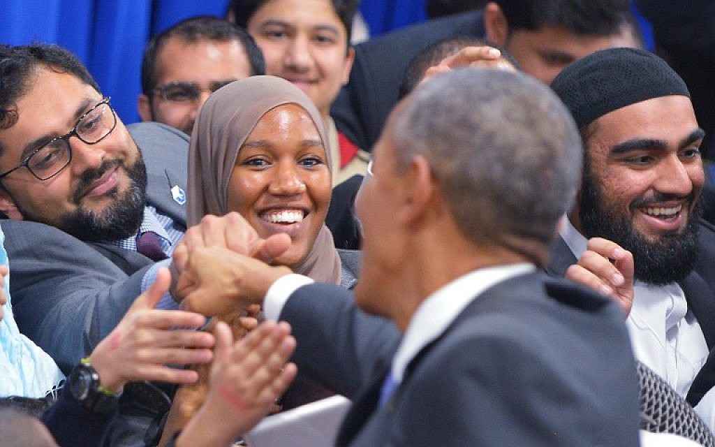 US President Barack Obama greets attendees at the Islamic Society of Baltimore, in Windsor Mill, Maryland, on February 3, 2016. (AFP/MANDEL NGAN) US President Barack Obama greets attendees at the Islamic Society of Baltimore, in Windsor Mill, Maryland, on February 3, 2016. (AFP/MANDEL NGAN)