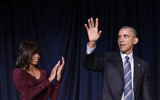 US First Lady Michelle Obama (L) applauds as US President Barack Obama waves after speaking at the National Prayer Breakfast on February 4, 2016 at a hotel in Washington, DC. (AFP/MANDEL NGAN) US First Lady Michelle Obama (L) applauds as US President Barack Obama waves after speaking at the National Prayer Breakfast on February 4, 2016 at a hotel in Washington, DC. (AFP/MANDEL NGAN)