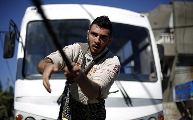 Pulling buses with his teeth, Gaza's Jason Statham | The Times of Israel