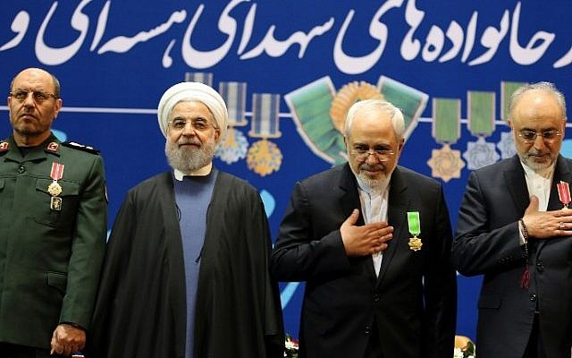 Iran's Defense Minister Hossein Dehghan (L), Foreign Minister Mohammad Javad Zarif (2nd from R) and Ali Akbar Salehi (R), the head of Iran's Atomic Energy Organization, pose for pictures after receiving the Medal of Honor from President Hassan Rouhani (2nd from L) for their role in the implementation of a nuclear deal with world powers, on February 8, 2016, in Tehran. (Atta Kenare/AFP) Iran's Defense Minister Hossein Dehghan (L), Foreign Minister Mohammad Javad Zarif (2nd from R) and Ali Akbar Salehi (R), the head of Iran's Atomic Energy Organization, pose for pictures after receiving the Medal of Honor from President Hassan Rouhani (2nd from L) for their role in the implementation of a nuclear deal with world powers, on February 8, 2016, in Tehran. (Atta Kenare/AFP)